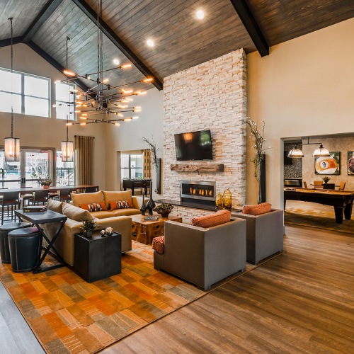 Clubhouse Spacious and well lit clubhouse with bar seating and ample chairs for entertaining.