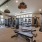 Large fitness center with cardio and weight lifting equipment.